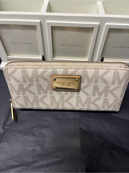 Michael Kors Handbags - Michael Kors Beige Signature Zip Wallet with Gold Plate